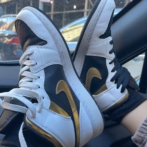 Jordan 1 mid . White, black and gold . Size 6y . Worn 3 times